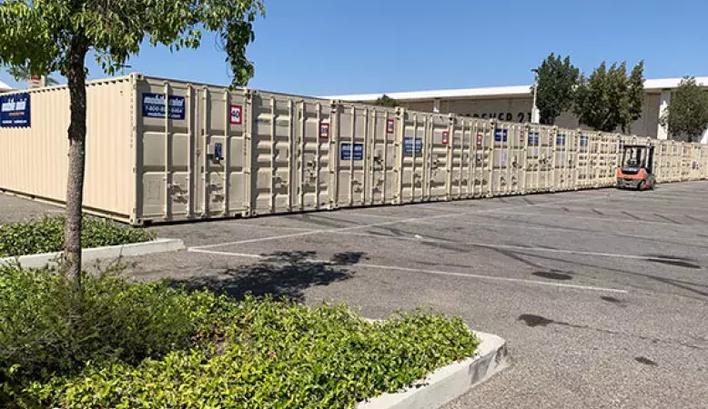 Mobile Mini Units lined up outside business for extra inventory space
