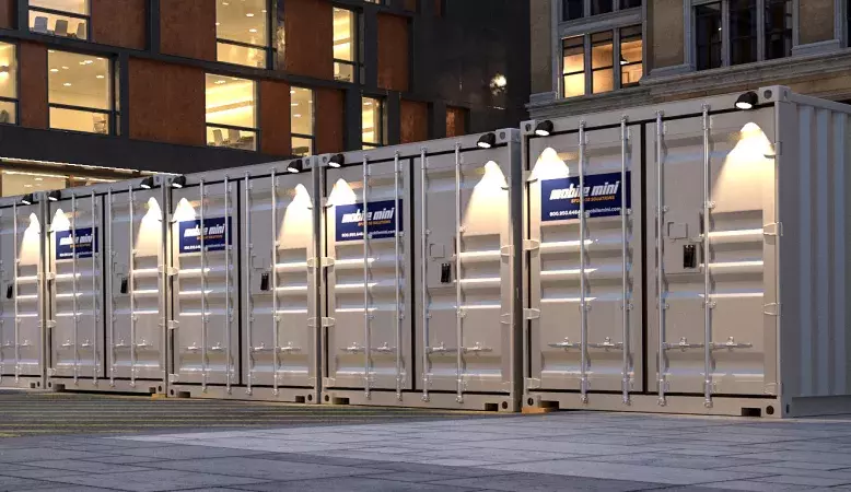 Mobile Mini containers lined up outside of building